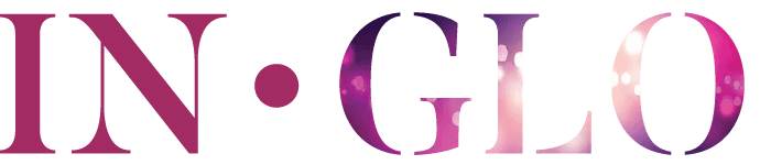 a letter g with purple dots